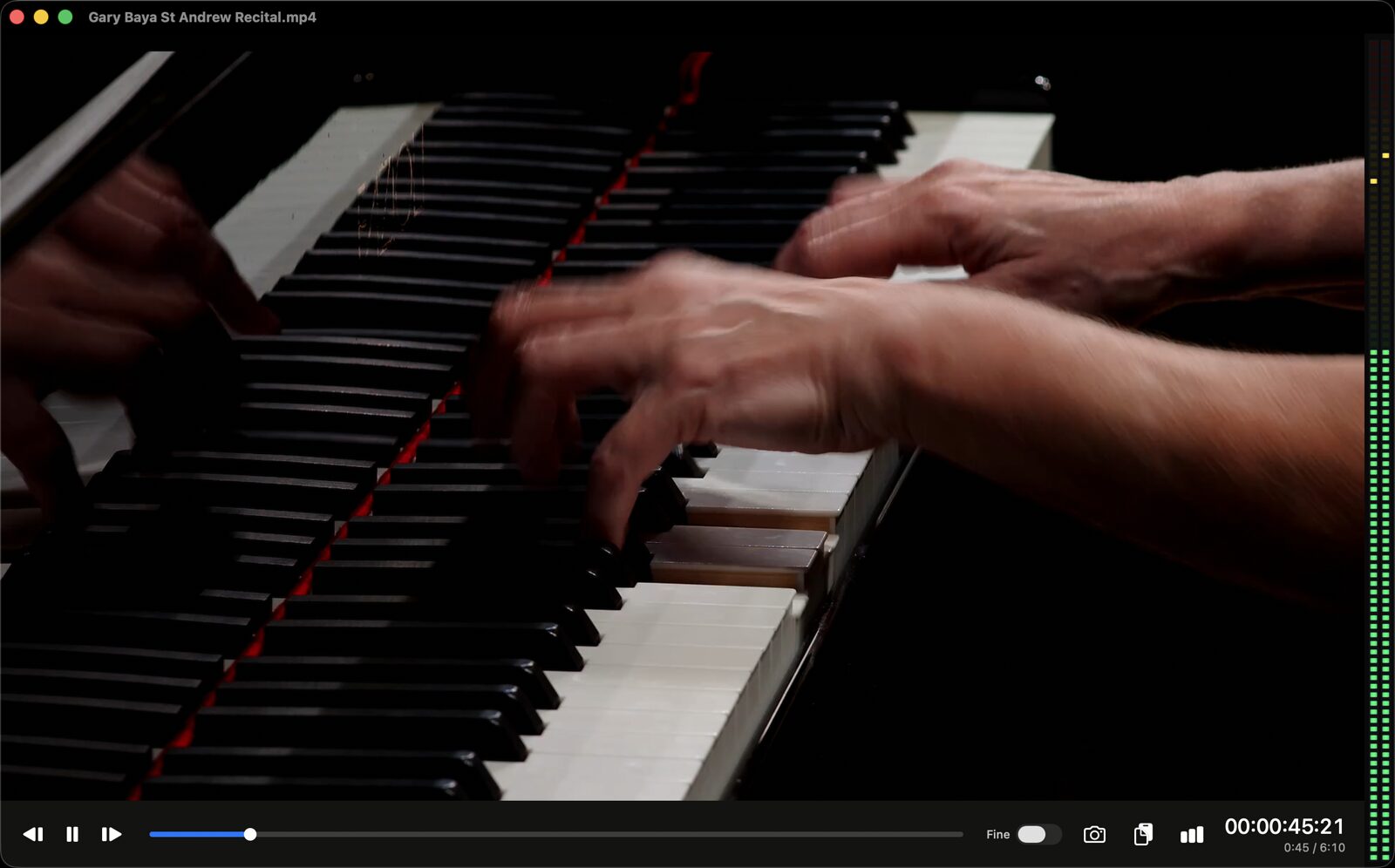 The Spectus player mid-scrub over a piano recital, with transport controls, frame export, and audio meters